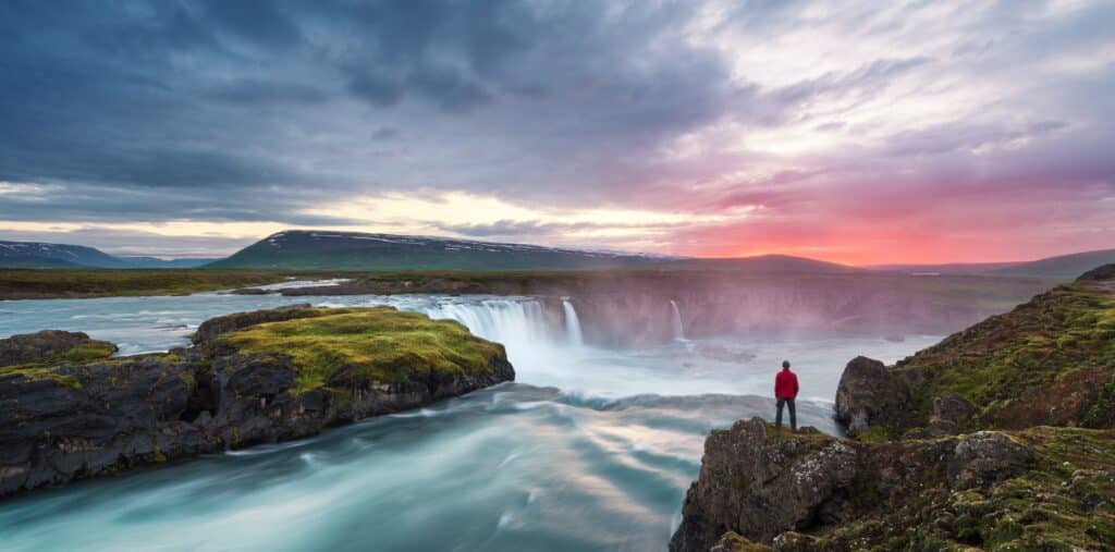 A spectacular Iceland sunset overlooking a waterfall