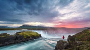 A person waterfall in Iceland.