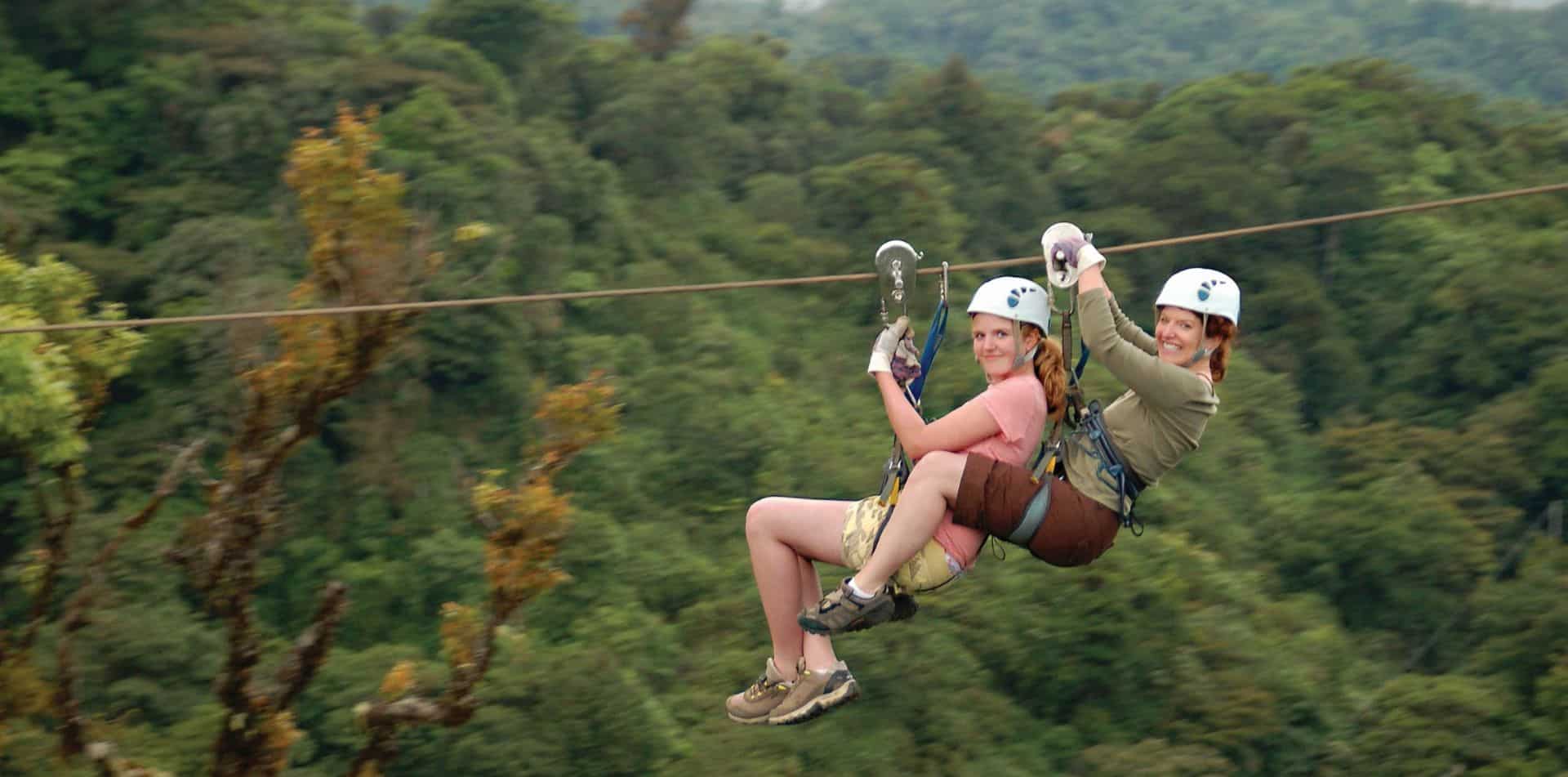 Woman Zip Lining in Costa Rica