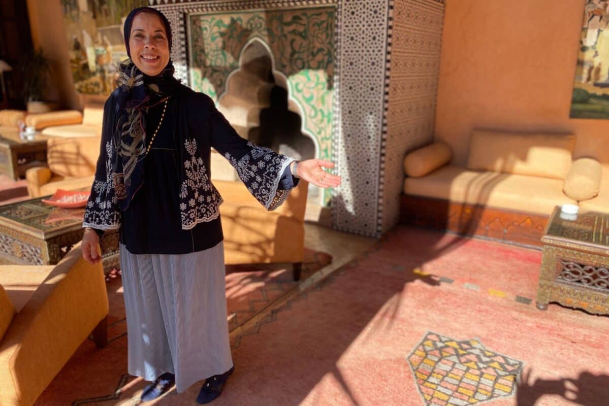 Local Moroccan woman welcoming into a traditional Moroccan room, Marrakech