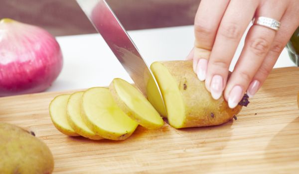 Cutting a potato